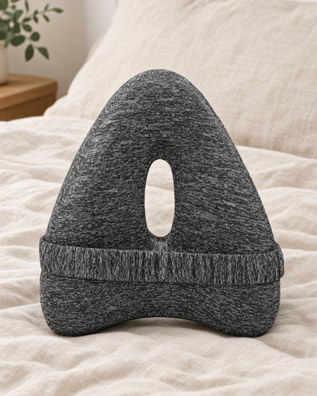Snuggi knee pillow on linen