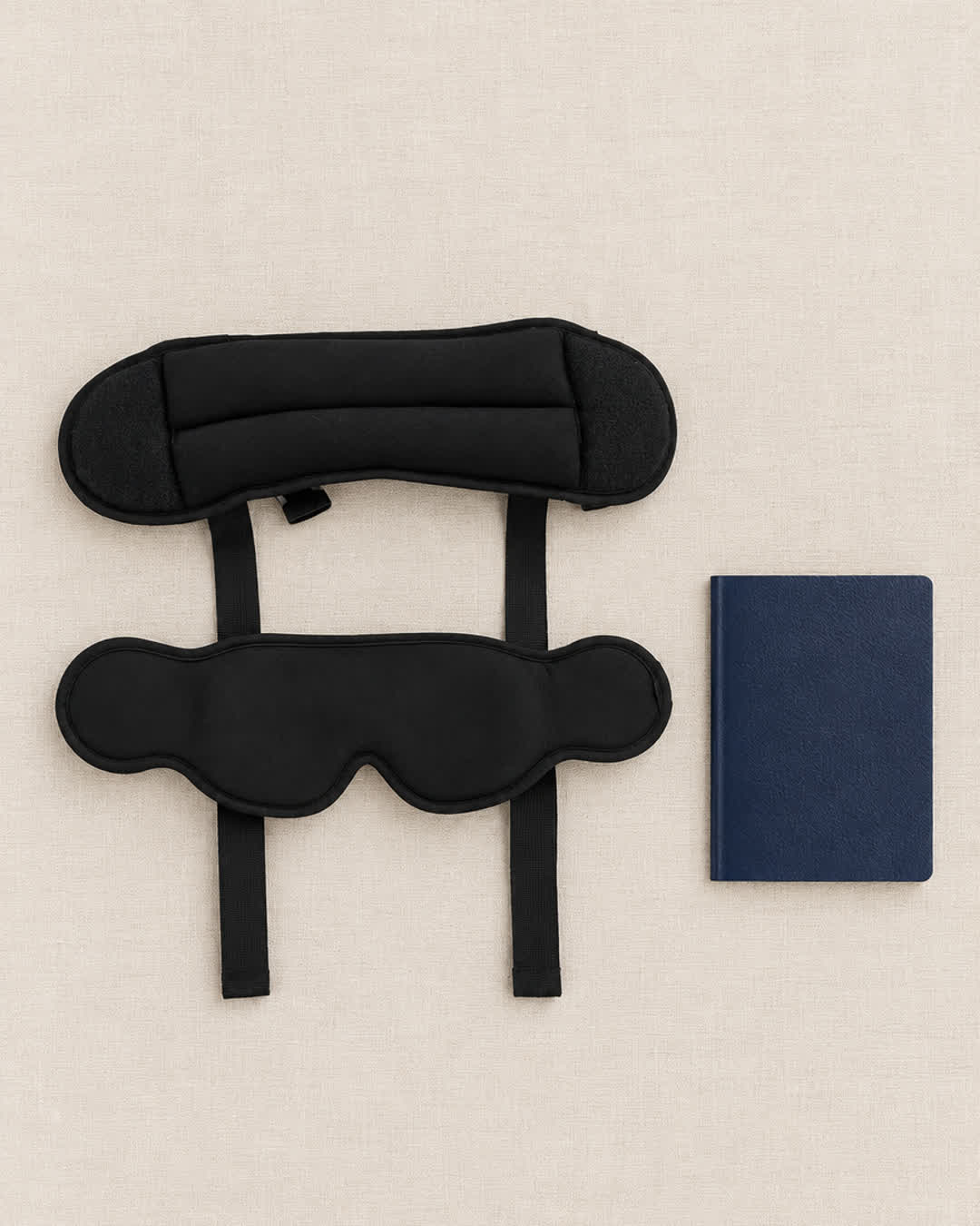 Snuggi Travel Sleep Sling travel size next to a passport